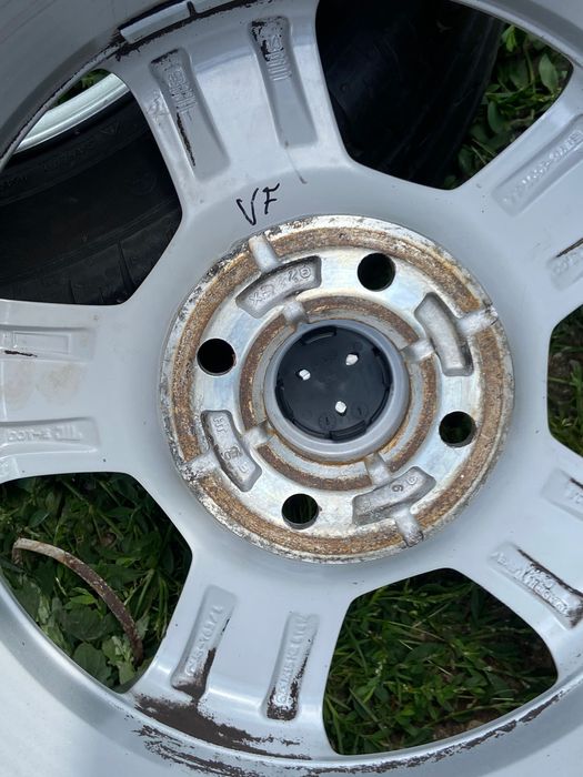 Alufelgi orginalne Ford 15-4x108 z oponami letnimi continental