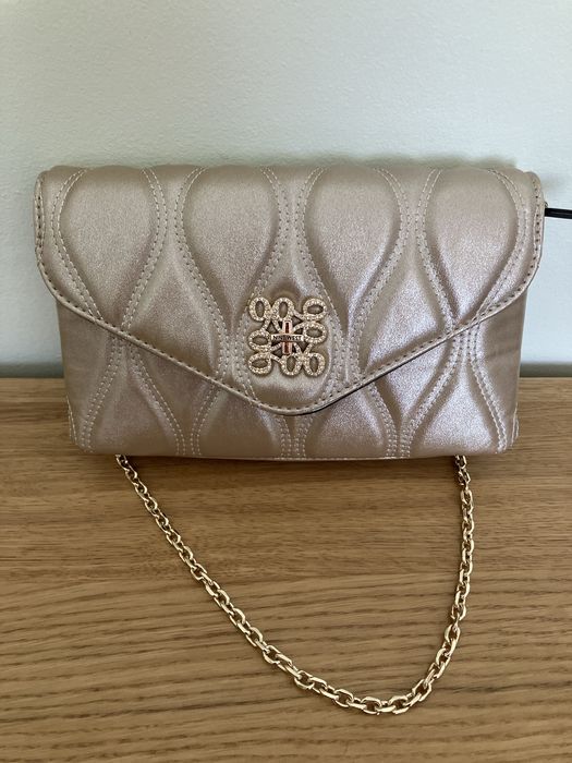 Sprzedam torebke NINE WEST nowa bezowa z polyskiem zlotym