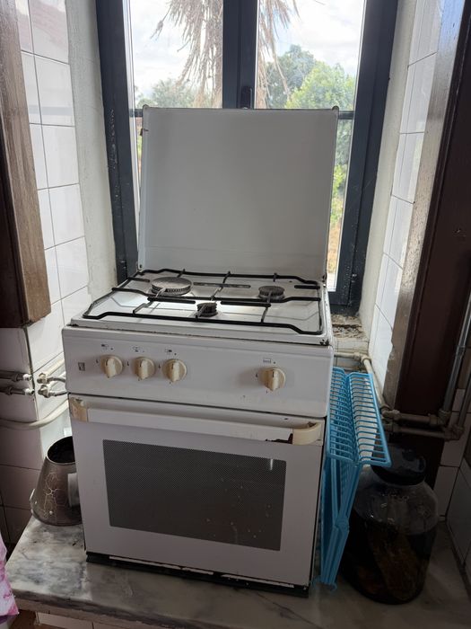 Fogao a gaz em estado de foncionamento