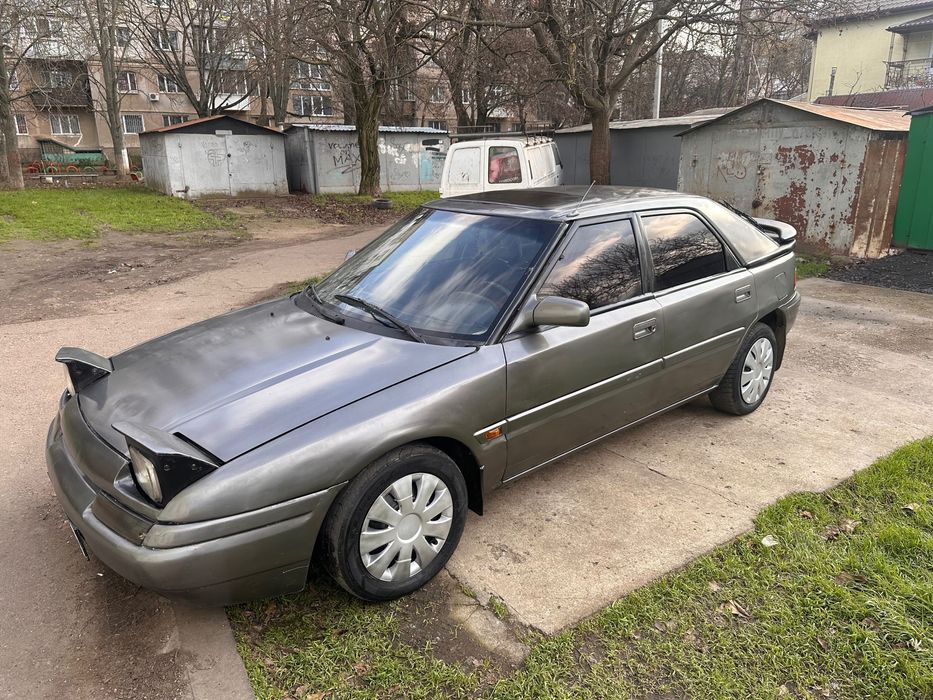 Mazda 323  1.6 сел поехал