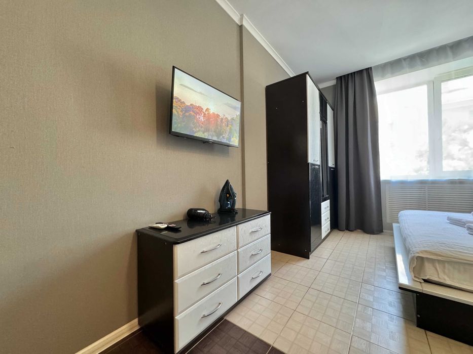 ApartPoltava Світлі апартаменти ПОДОБОВО біля театру Гоголя, чек ПРРО