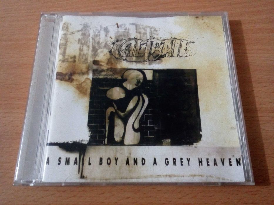CALIBAN - A Small Boy And A Grey Heaven Death Metal - Baixa De Preço