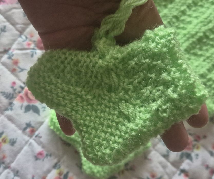 Casaco de malha feito a mão com carapins