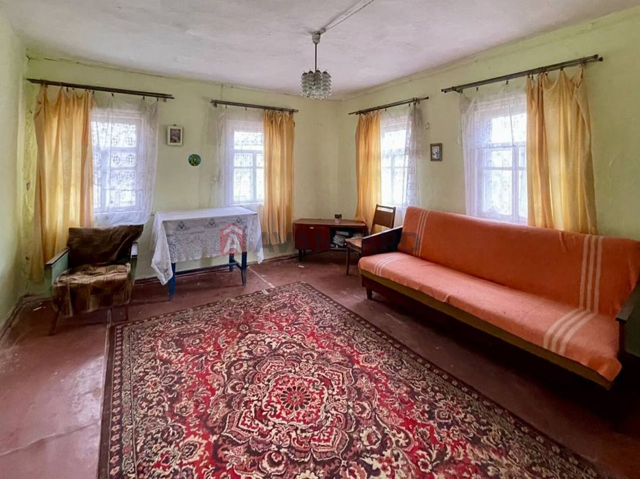 Ділянка 25 сотих з будинком в с. Худяки