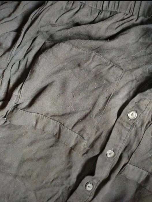 Czarna sukienka szmijzerka