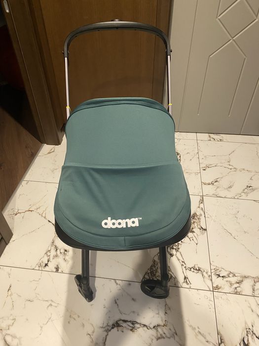 Продам автокресло коляска DOONA