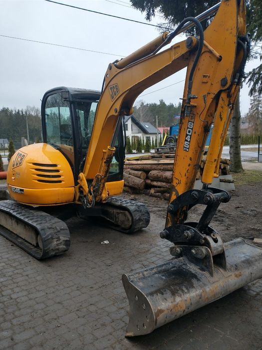 Pomoc drogowa, laweta, transpo maszyn, usługi minikoparka