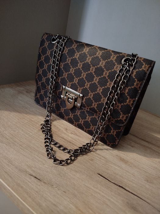 Жіноча сумочка..