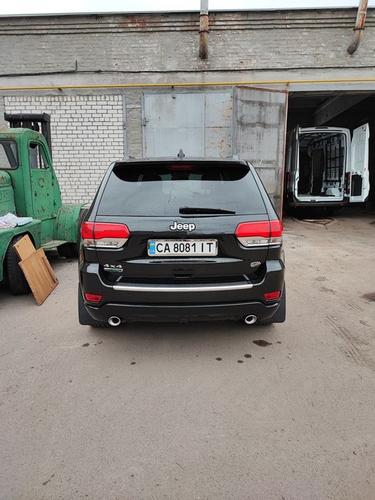 Jeep Grand Cherokee 2015 VIN 1C4RJFCM1FC618540 фото оголошення 5 з 8
