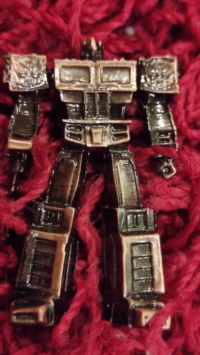 Boneco de metal Transformers
