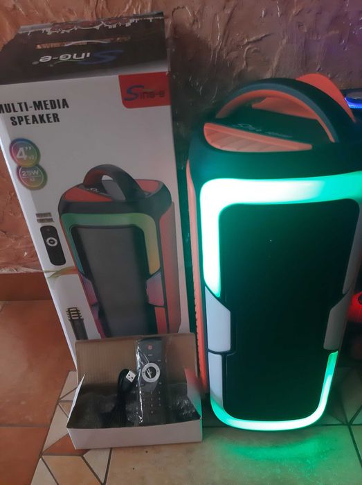 Колонка нова з мікрофоном та пультом