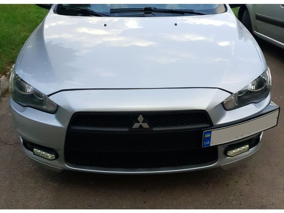 Mitsubishi Lancer X Подіум під номер чорний мат