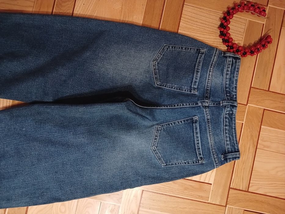 Джинси труби синього кольору
