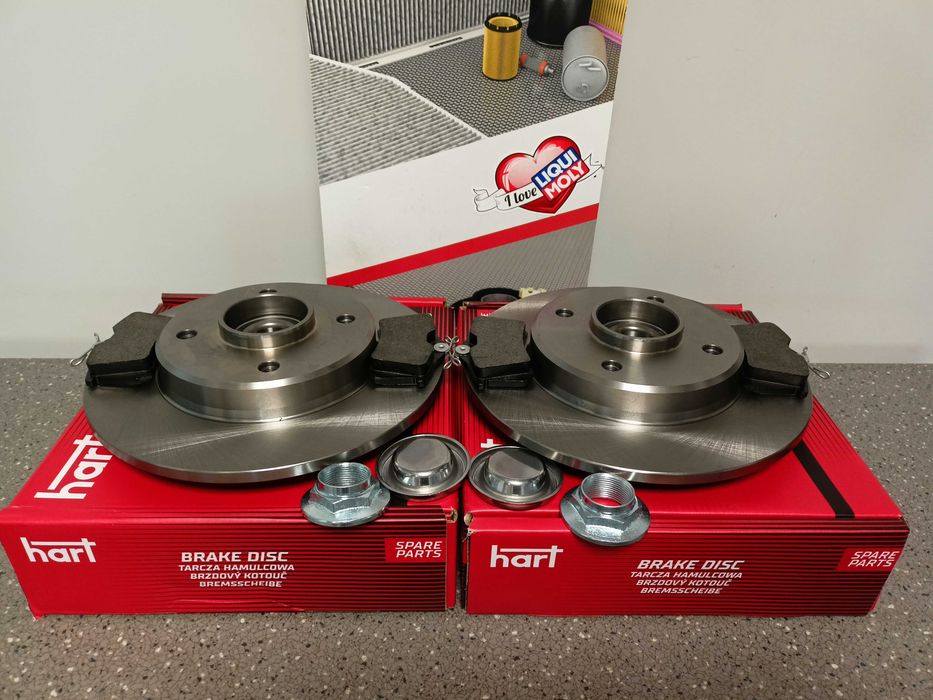 Citroen C3,C4,207,307 Tarcze hamulcowe tył z łożyskami + klocki kpl.>