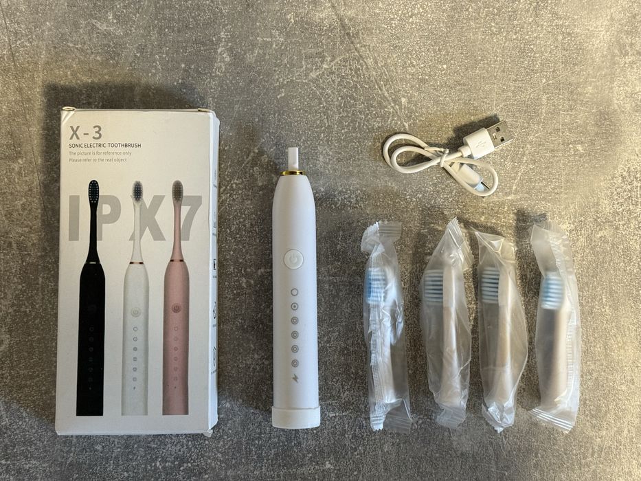 Електрична зубна щітка