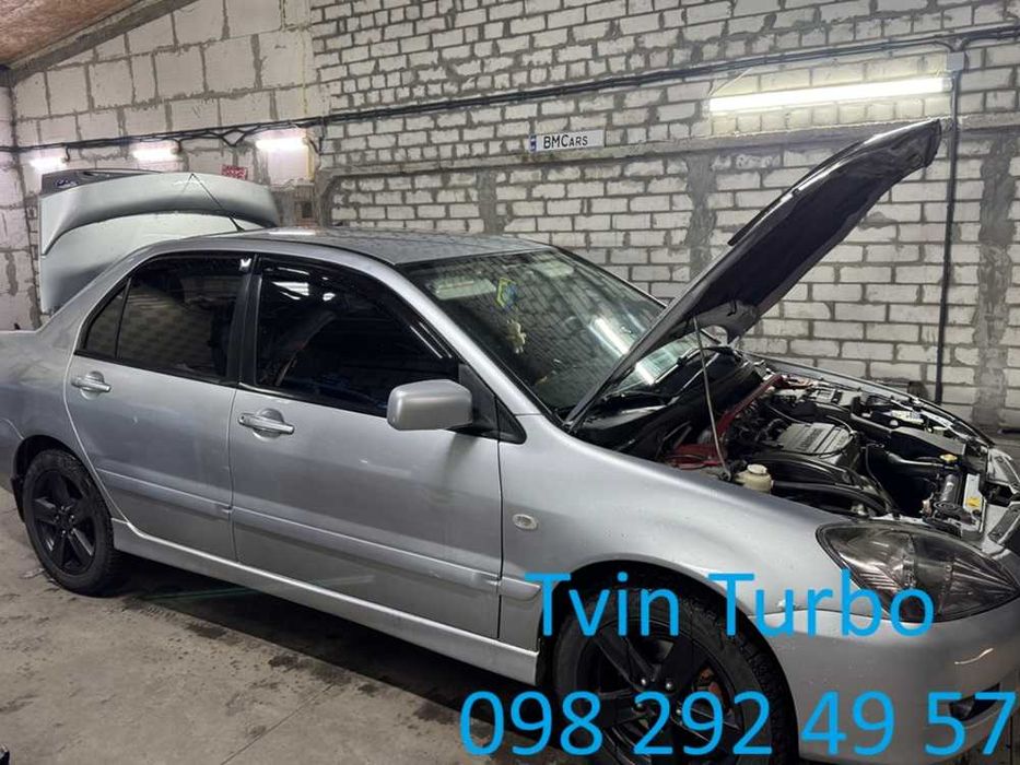 Накладки на пороги спойлер юбки реснички клыки Mitsubishi Lancer 9 10