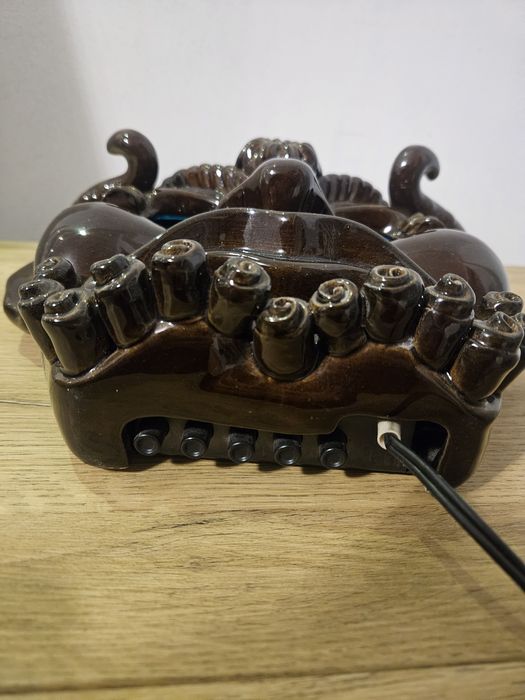 zegar cyfrowy w kształcie maski Satyr.