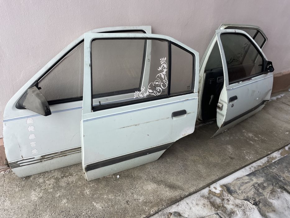 Двері Крило Капот Opel Kadett