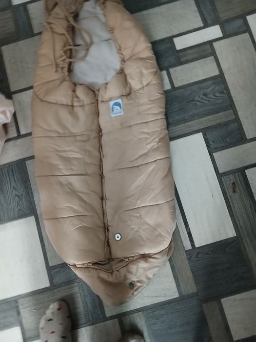 Продам зимовий  конверт,бренд