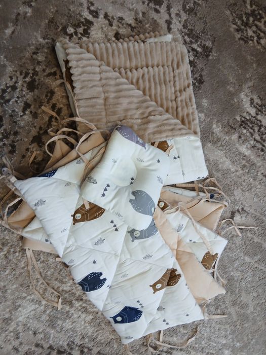 Бортики у дитяче ліжечко