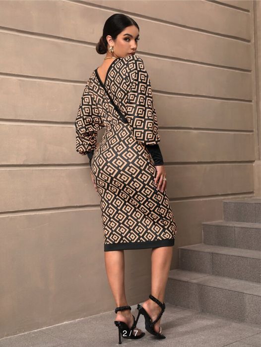 Вишукана жіноча сукня міді від Shein