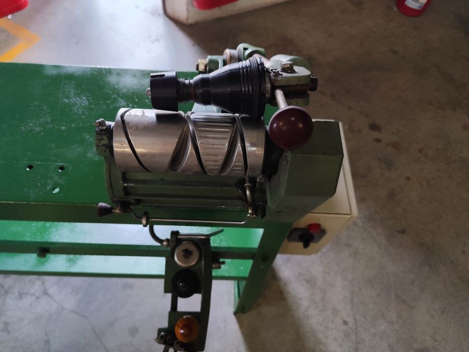 Máquina de rebobinar fio.