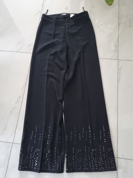Spodnie czarne żorżeta wełniana z cekinami na wesele 38