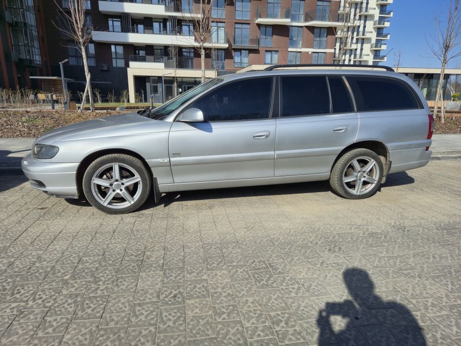 Opel Omega B.    —    2,5TD   M57.    
Про