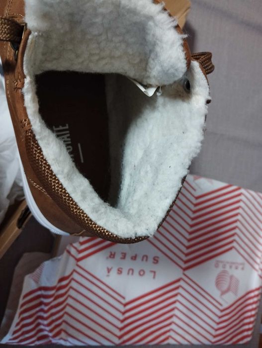 Bota em ótimo estado para rapaz