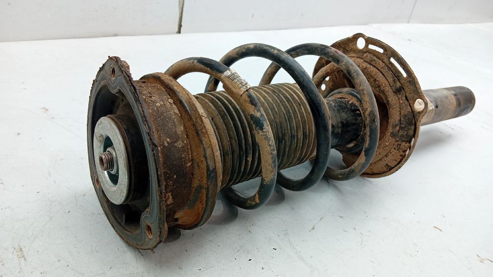 Amortecedor frente esquerdo VOLKSWAGEN Golf VII (5G1, BQ1, BE1, BE2)