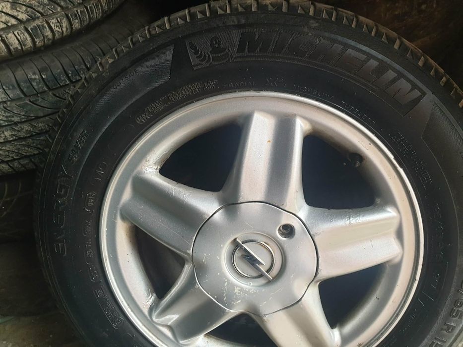 Oryginalne Alufelgi Opel 15 Komplet 4 szt. + Dekielki