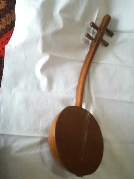 Réplica de instrumento para decoração