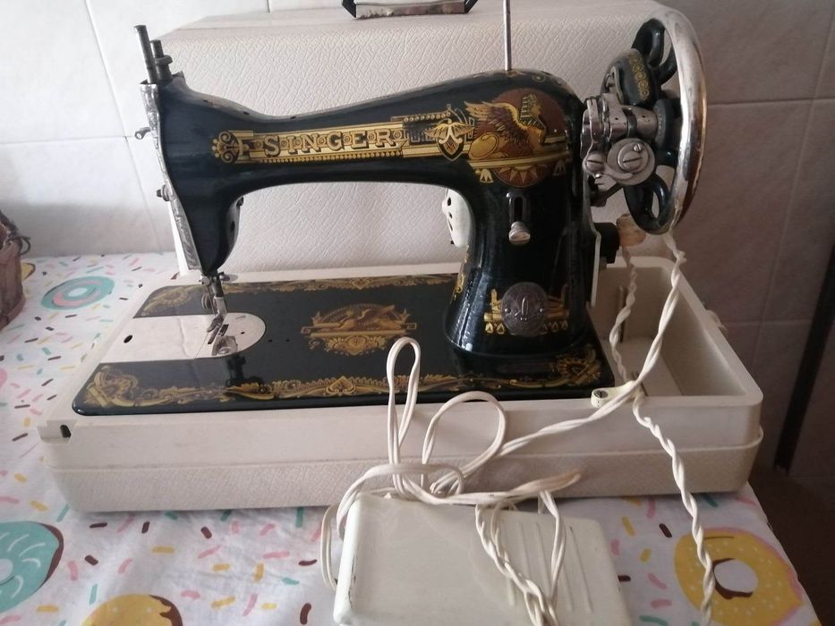 Máquina de costura singer