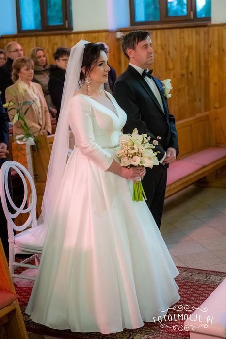 Suknia ślubna z rękawem