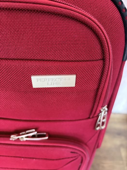 Дорожня валіза на колесах, стан нової