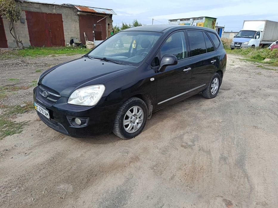 Киа Каренс  2.0газ /бензин