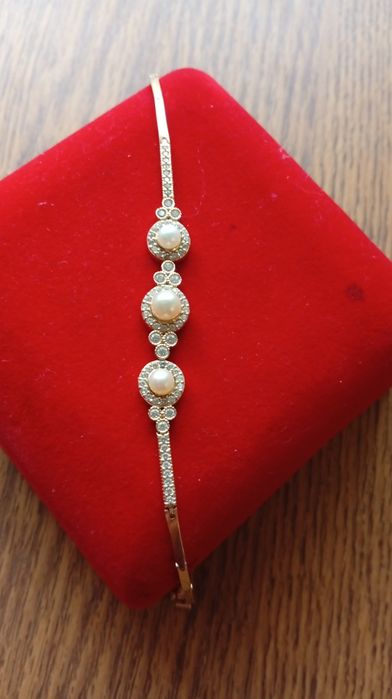 Золотий браслет з перлами 585