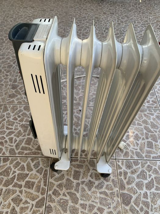 Aquecedor a oleo Junex estado novo