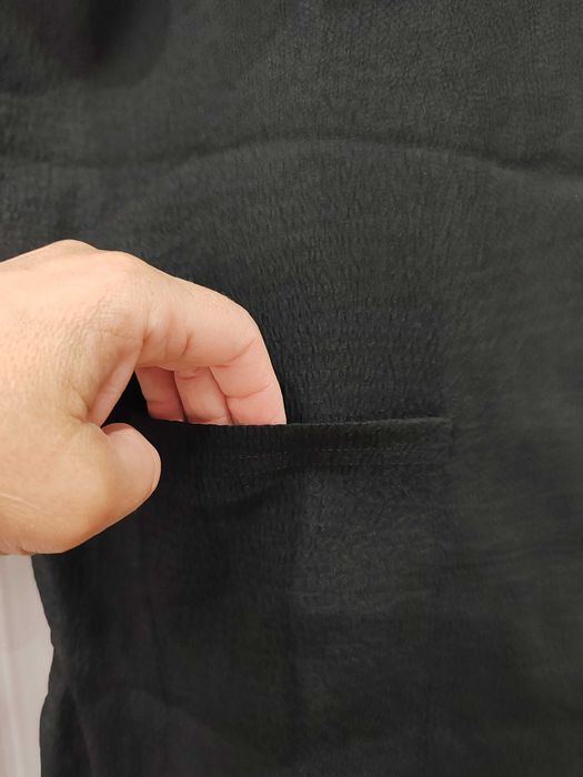 Czarny wygodny długi kombinzon rozmiar ok 44 poliester/spandex