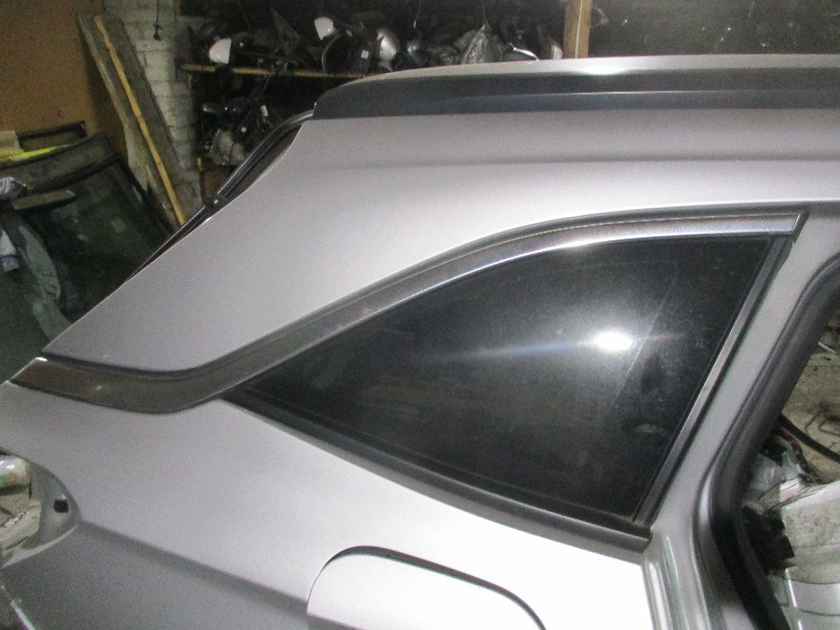 Opel Astra K V 5 Kombi szyba karoseri prawa kompletna z chromem