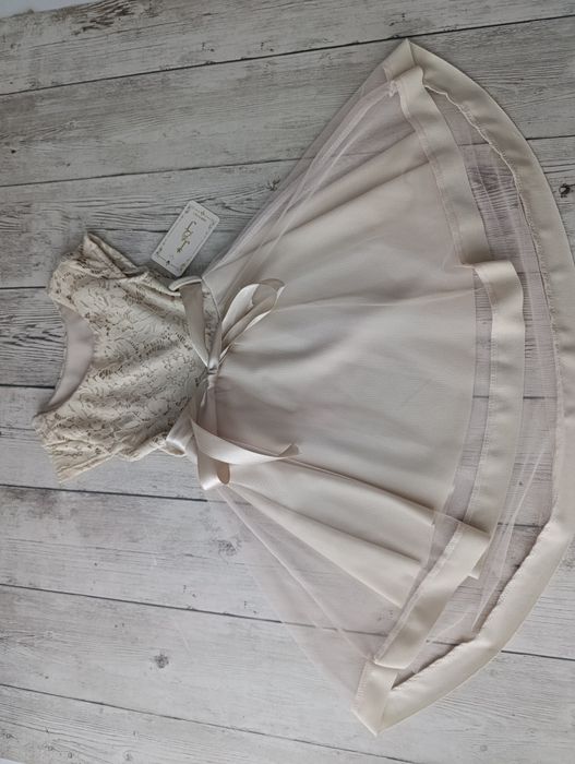 Wyprzedaż- elegancka sukienka r. 4 l. (104)