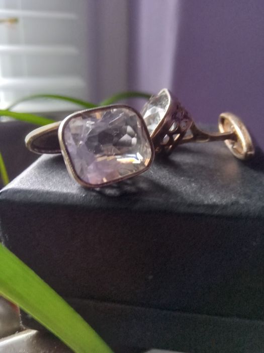 Серебряные запонки.