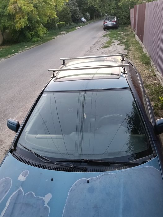 Мазда 323 F BA .