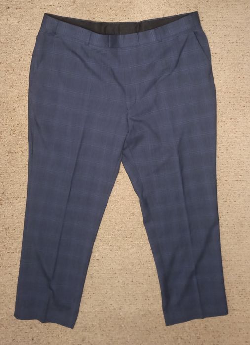 Фірмові брюки великого розміру у новому стані