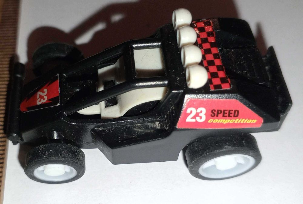 Игрушка гоночная машинка багги мини.