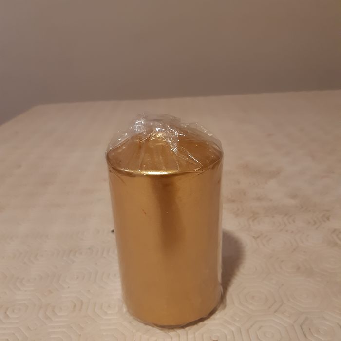 Vela decorativa dourada