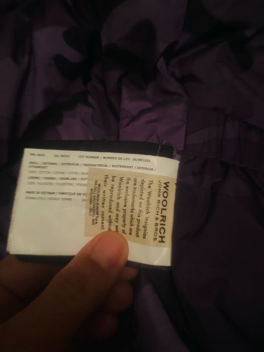 Жилетка безрукпвка пуховик Woolrich