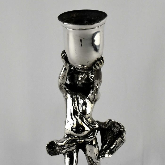 Castiçal em casquinha com figura de Putto