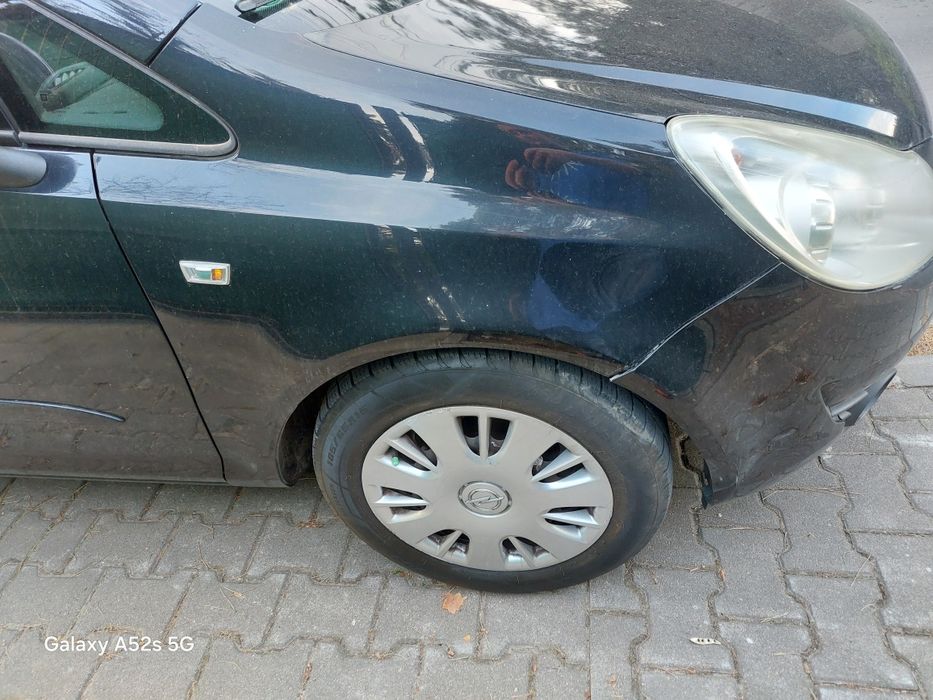 Błotnik lewy prawy Opel Corsa D Z20R