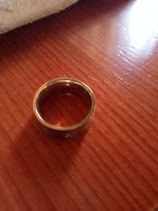 Aliança em aço com brilhante e segmento